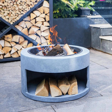 2 Bracieri in acciaio e console rotonda in fibra