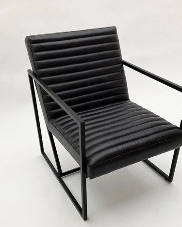 Poltrona in pelle e ferro Fritz